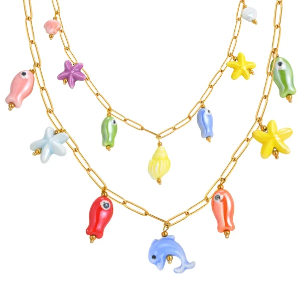 collier étoile de mer conque dauphin et goutte