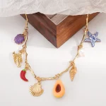 collier artisanal bohème à breloques