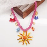 collier perlé avec charms bohèmes