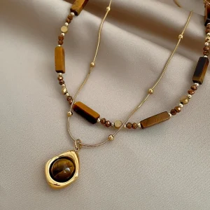 colliers superposés pendentif œil de tigre